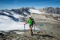 Man trekking in the Alps in a beautiful sunny day. Grand Paradiso National Park. Italy