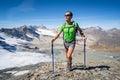 Man trekking in the Alps in a beautiful sunny day. Grand Paradiso National Park. Italy