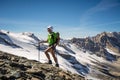 Man trekking in the Alps in a beautiful sunny day. Grand Paradiso National Park. Italy