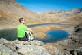 Man trekking in the Alps in a beautiful sunny day. Grand Paradiso National Park. Italy