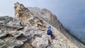 Man trekking on mystical hiking trail leading to Mount Olympus (Mytikas, Skala, Stefani) in Mt Olympus National Park