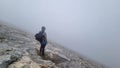 Man trekking on mystical hiking trail leading to Mount Olympus (Mytikas, Skala, Stefani) in Mt Olympus National Park