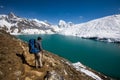 Man is trekking near Gokyo lake in Everest region, Nepal Royalty Free Stock Photo