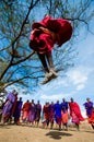 The man of a tribe Masai shows ritual jumps. Royalty Free Stock Photo