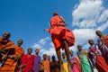 The man of a tribe Masai shows ritual jumps. Royalty Free Stock Photo