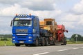 MAN Truck Hauls Two Combine Harvesters Royalty Free Stock Photo