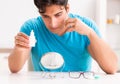 Man trying contact lenses at home Royalty Free Stock Photo