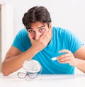 Man trying contact lenses at home Royalty Free Stock Photo