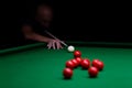 Man trying to hit the ball in snooker Royalty Free Stock Photo