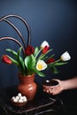 Man with tulips, kurt and Kazakh tea on Nauryz festival Royalty Free Stock Photo