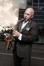 Man in a tux playing a saxophone Royalty Free Stock Photo