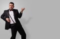 Man in tuxedo playing rock-n-roll Royalty Free Stock Photo