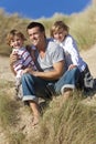 Man & Two Boy, Father and Sons Having Fun At Beach Royalty Free Stock Photo