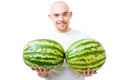 Man with two watermelons show double growth