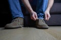 Man tying casual shoes Royalty Free Stock Photo