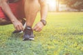 Man tying rope on his sports shoe. Preparing for run in the park Royalty Free Stock Photo