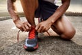 Man tying running shoes Royalty Free Stock Photo