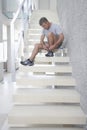 Man Tying Shoelace On Steps Royalty Free Stock Photo