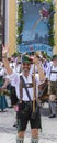 A man in typical bavarian leather pants attending the Gay Pride parade also known as Christopher Street Day CSD in Munich, Germ