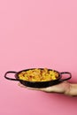 Man with a typical spanish paella valenciana Royalty Free Stock Photo