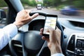 Man Typing Text Message On Mobile Phone While Driving Car Royalty Free Stock Photo