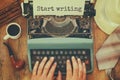 Man typing on vintage typewriter with text: START WRITING