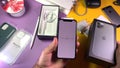 Man unboxing latgest Apple Computers iPhone 11 Pro