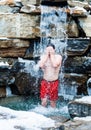 Man under Nordic Cold Water Spa Cascade Royalty Free Stock Photo