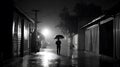 man under the rain with an umbrella in a dark street - generative AI Royalty Free Stock Photo