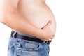 Man with unhealthy big belly isolated in white