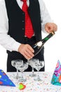 Man unlocks champagne Royalty Free Stock Photo