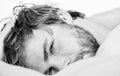 Man unshaven bearded face sleep relax or just wake up. Guy bearded macho relax in morning. Total relax concept. Man Royalty Free Stock Photo