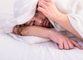 Man unshaven handsome relaxing bed. Let your body feel comfortable. Man sleepy drowsy unshaven bearded face covered with