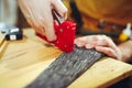 Man upholstering chair in his workshop Royalty Free Stock Photo