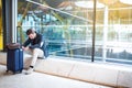 Man upset, sad and angry at the airport his flight is delayed Royalty Free Stock Photo