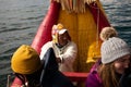 The man from Uros community on the traditional boat made from totora reeds