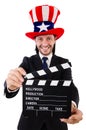 Man with USA hat and movie board isolated