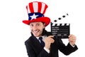 Man with USA hat and movie board isolated