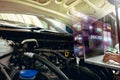 Man use laptop to analysis on his car engine with hologram. the concept of engine service hologram. Royalty Free Stock Photo
