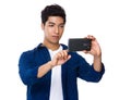 Man use mobile phone to take photo Royalty Free Stock Photo