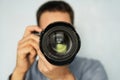 The man use the professional camera with telephoto lens Royalty Free Stock Photo