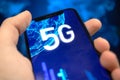 Man uses smartphone with 5G network connection. Future of high speed mobile internet, global wireless technology