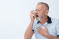 Man using asthma inhale Royalty Free Stock Photo