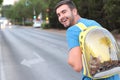Man using backpack with a porthole for his pet Royalty Free Stock Photo