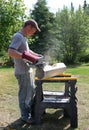 Man Using Belt Sander