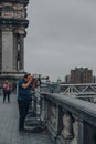 Man using binoculars on the viewing platform in Brussels, Belgium