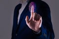 Man using biometric fingerprint scanner on grey background, closeup Royalty Free Stock Photo