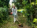 Man using brush cutter