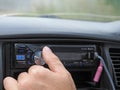 Man using car audio stereo magnet. Royalty Free Stock Photo