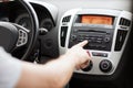 Man using car audio stereo system Royalty Free Stock Photo